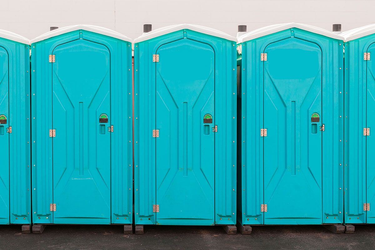 Industrial portable restroom units at a plant in Fort Pierce, Florida